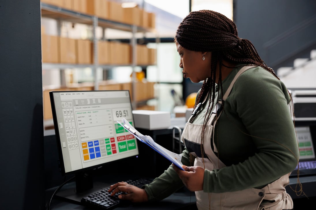 Worker Looking at an Inventory Report